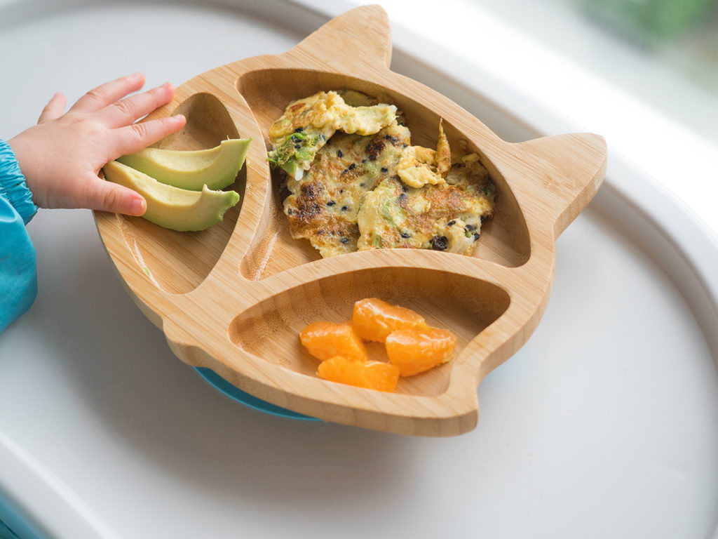 Baby-Led Weaning Creating Health baby eating foods from plate