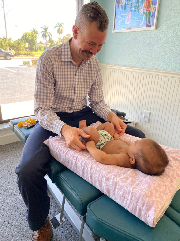 Baby seeing a pediatric chiropractor