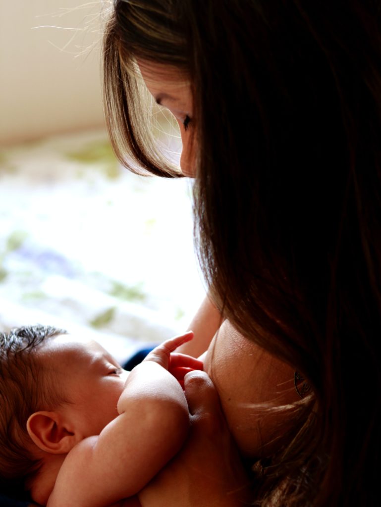 Mother nursing baby